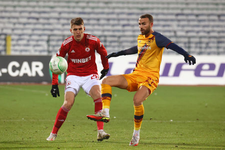 Sofia, Bulgaria - 9 December, 2021: Player of CSKA Sofia in action against Borja Mayoral (R) of AS Roma during the UEFA Europa Conference League group C soccer match between CSKA Sofia and AS Roma.のeditorial素材