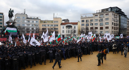 Sofia, Bulgaria - 12 January, 2022: People try to enter the Bulgarian Parliament building during a protest against green certificate (EU Digital COVID Certificate) and vaccination against COVID-19.のeditorial素材