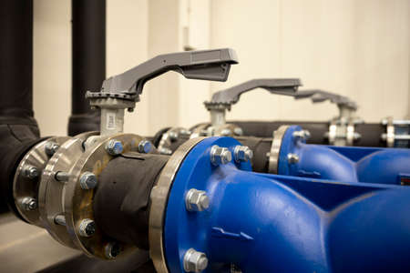 Cooling system of a supercomputer. Metal pipes with valves.の写真素材