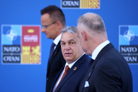 Spain, Madrid - 30 June, 2022: Hungary's President Viktor Orban (C), Defence Minister Kristof Szalay-Bobrovniczky (R) and Foreign Minister Peter Szijjarto (L) attend the NATO summit in Madrid, Spain.のeditorial素材