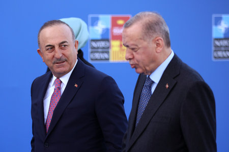 Spain, Madrid - 30 June, 2022: Turkish President Recep Tayyip Erdogan (R) and Turkish Foreign Minister Mevlut Cavusoglu attend the NATO summit in Madrid, Spain.のeditorial素材