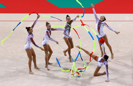 Sofia, Bulgaria - 16 September, 2022: Members of team Ukraine in action with 2 balls and 3 ribbons during the 39th FIG Rhythmic Gymnastics World Championships.のeditorial素材