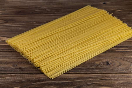 Spaghetti pasta on stone tableの写真素材