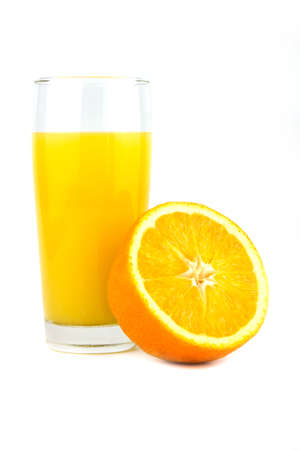 Fresh ripe orange and orange juice on a wooden background. Close upの写真素材