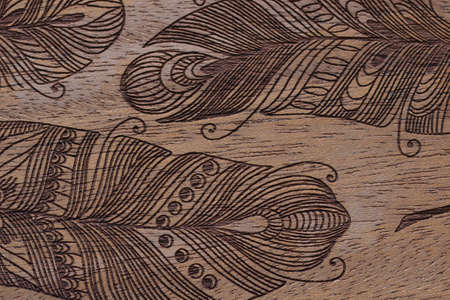 Pattern on a wooden background. Close upの写真素材