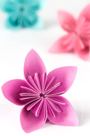 Single paper flower isolated on a white backgroundの写真素材