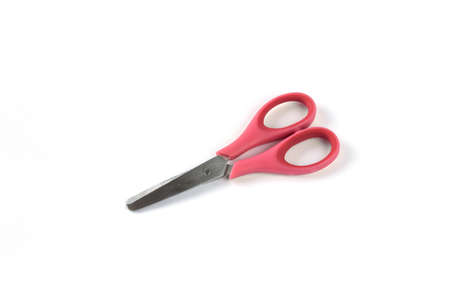red scissors isolated on whiteの写真素材