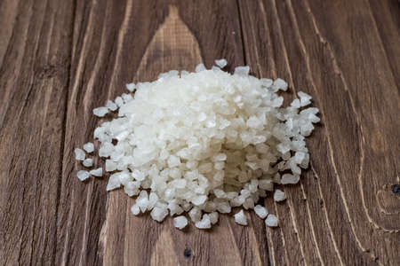 Small pile of sea sault on wooden backgroundの写真素材