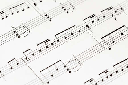 music-notes on white paper macroの写真素材
