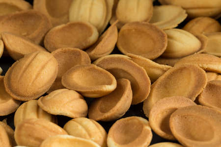 Pile of cookies in walnut formの写真素材