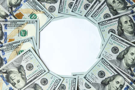 One hundred dollar banknotes around empty spaceの写真素材