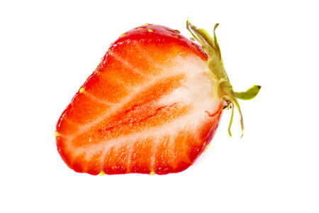 Sliced hald of ripe strawberry isolated on white background.の写真素材