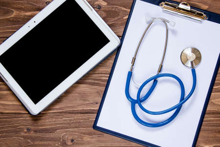 Note pad and other objects for doctors officeの写真素材