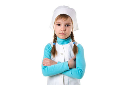 Professional female doctor with crossed armes, landscapeの写真素材