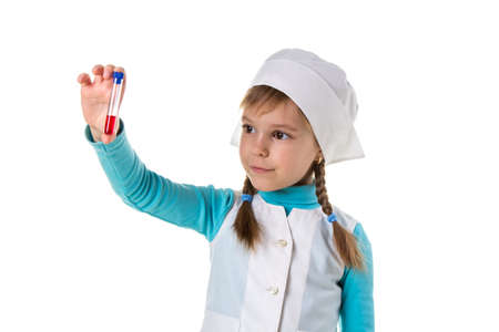 Nurse girl with vaccine in test tube, isolated in white background. Young nurse with tube in the right handの写真素材