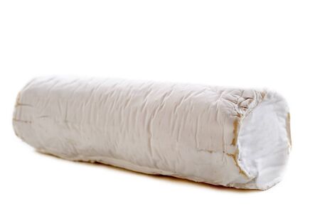 goat milk cheese in front of white backgroundの写真素材