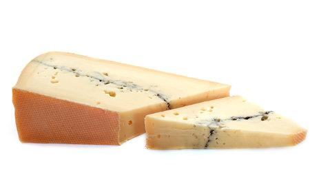 slice of french cheese morbier in front of white background