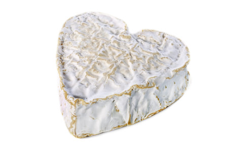 Whole Heartshaped Neufchatel cheese on white backgroundの写真素材