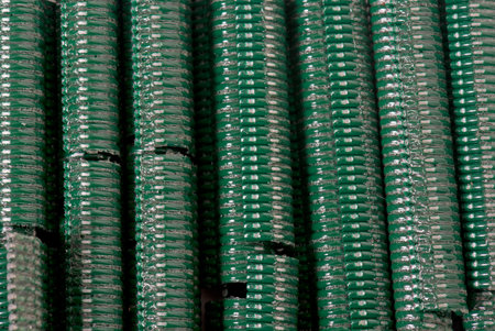 staples for wire fence in front of white background