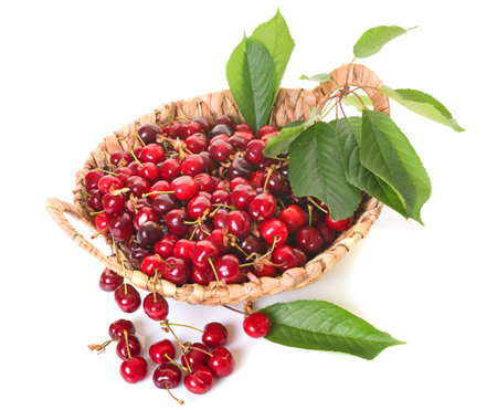 fresh burlat cherries in front of white backgroundの写真素材