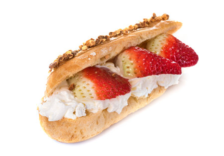 strawberry eclair in front of white background