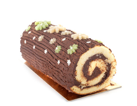 yule log in front of white backgroundの写真素材