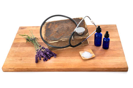 ancient bible in front of white backgroundの写真素材