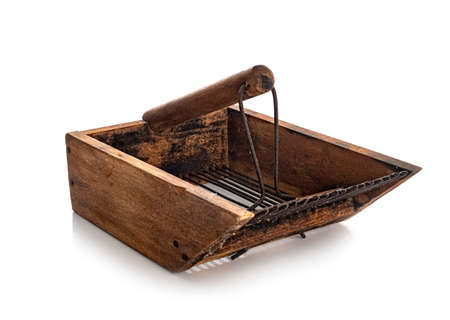 comb to picking blueberries in front of white backgroundの写真素材