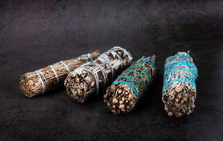 white sage incense in front of gray backgroundの写真素材