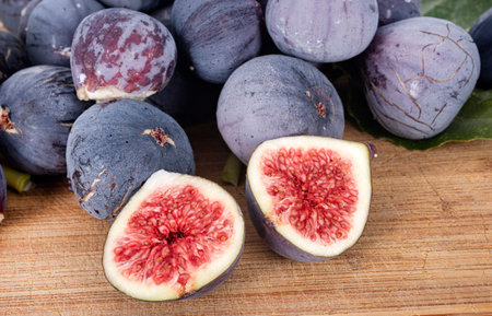purple figs in front of white background