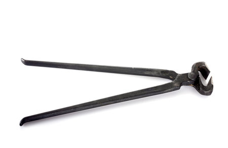 tools of blacksmith in front of white background
