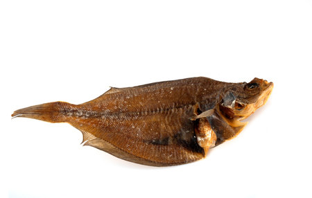 dried fish for dog in front of white background