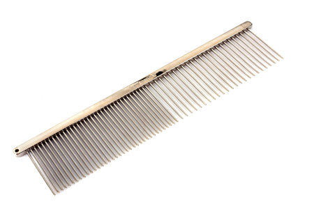 dog trimming equipment in front of white background