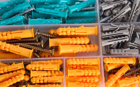 rawplug and screws in front of white background