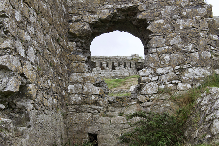 Window opening of an ancient castle ruin in remote Irelandの写真素材