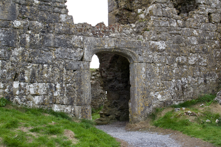 Entrance to an ancient castle ruin in remote Irelandの写真素材