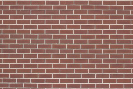 Vintage red brick wall texture in traditional running bond brickwork patternの写真素材