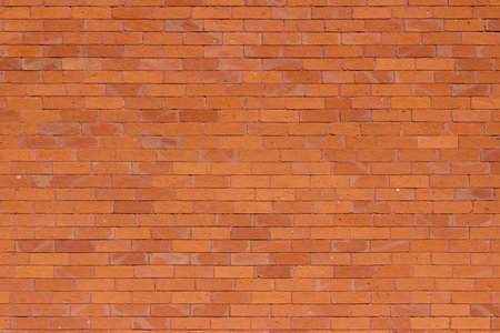 Traditional vintage running bond pattern shabby chic exterior brick wall texture background in...