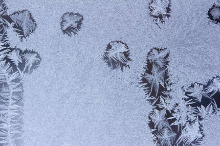 Frosted window abstract texture background with ice crystal designsの写真素材