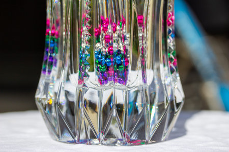 Macro abstract art design view of lead crystal glass surface texture reflecting brilliant natural...