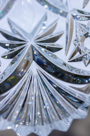 Macro abstract art design view of lead crystal glass surface texture reflecting brilliant blue sky...