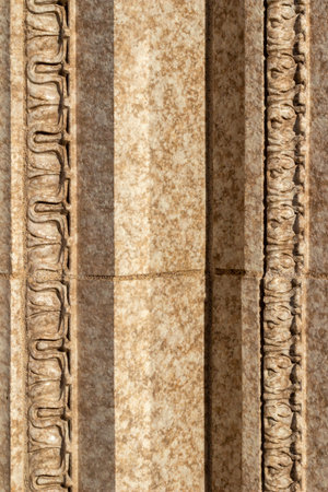 Close up abstract texture background of a beautiful beige color exterior vintage marble stone wall,...