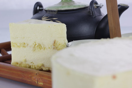 Cheesecake and teapotの写真素材