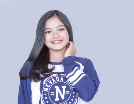 teenage girl with casual shirt smiling 2の写真素材