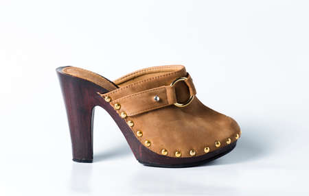 Woman brown shoe on white backgroundの写真素材