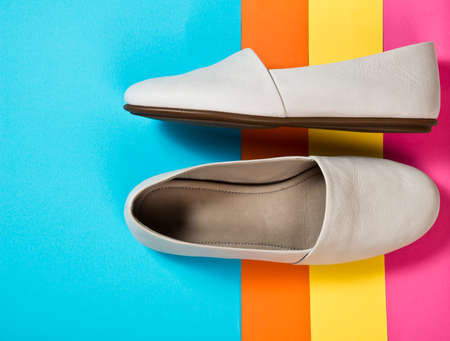 Woman casual gray leather shoes on blueの写真素材