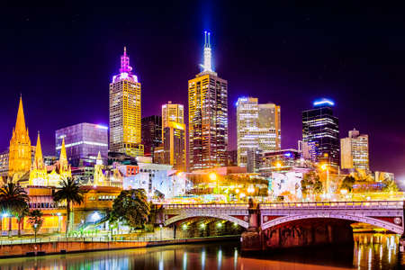 The world's most liveable city with a view of Federation Square and Melbourne City as seen from South Bank at night with all the city lightsのeditorial素材