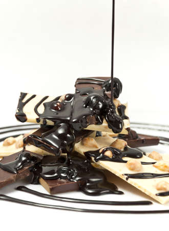 Chocolate pieces on the white backgroundの写真素材