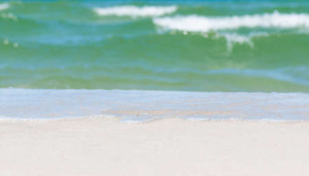 Beautiful coast with a beach and turquoise water in the seaの写真素材