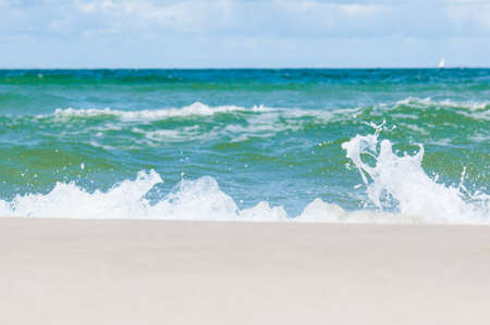 coast with a beach and turquoise water in the seaの写真素材